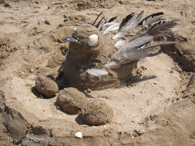 скульптура из песка чайка